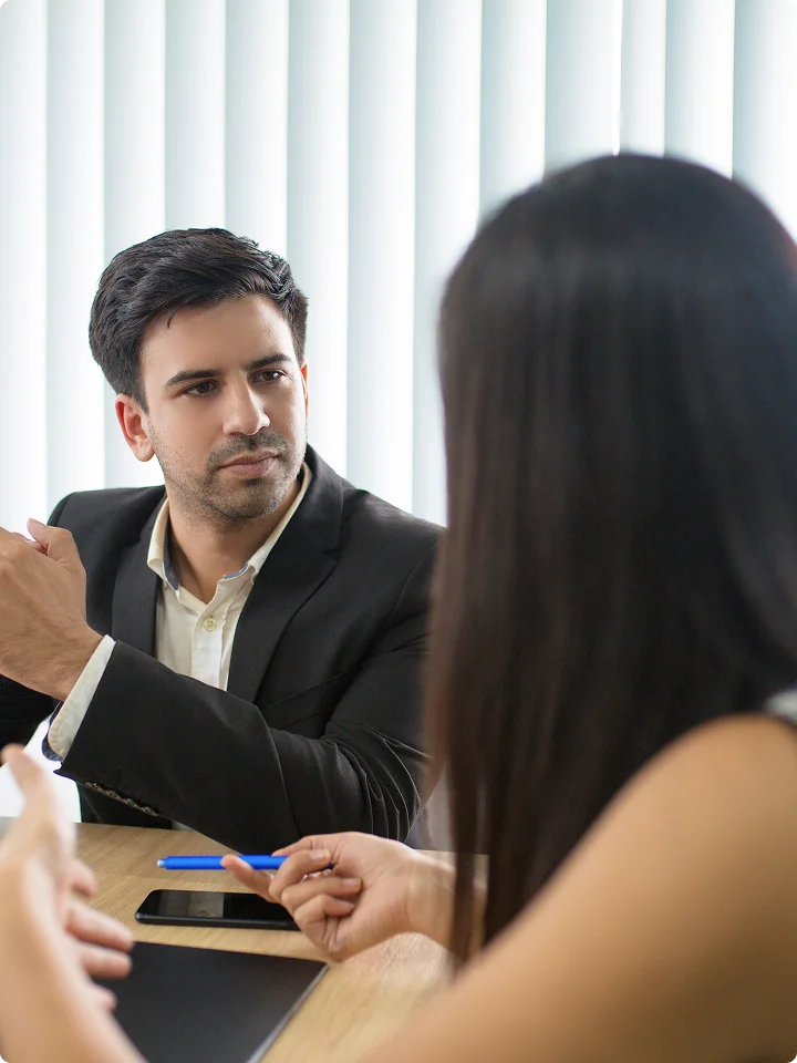 two people in a meeting